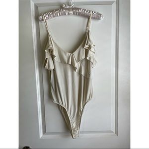 White ruffled bodysuit